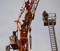 Person auf Baukran Koeln Christophstr P036